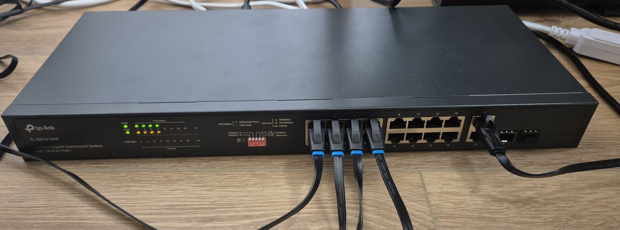 Four sensor cables in the supplied switch's PoE ports