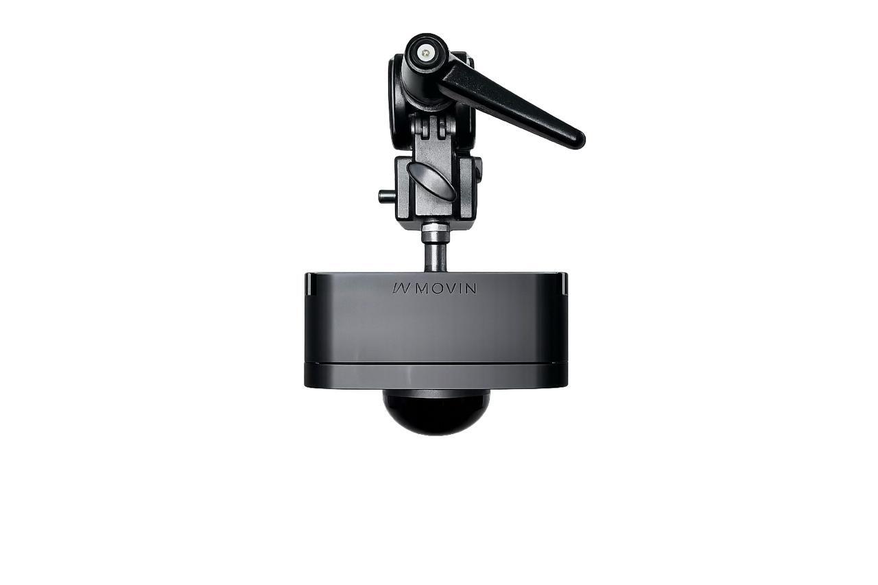 A LiDAR sensor held facing down on a mount by a stud